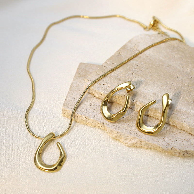 Solis Sculpted Arc Earrings