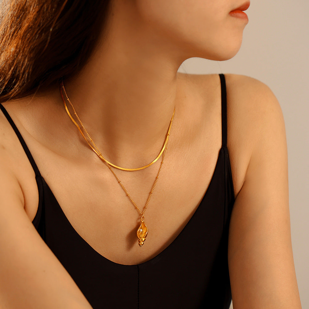 Sculpted Flame Shell Pendant