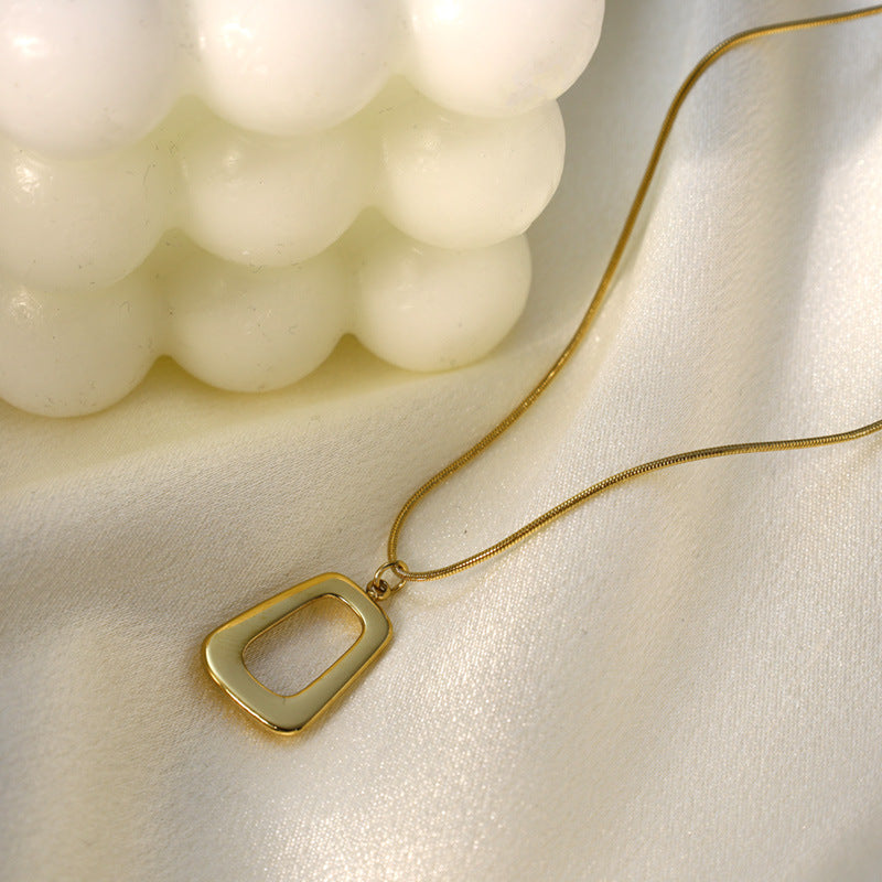 Gold Cutout Rectangle Pendant Necklace