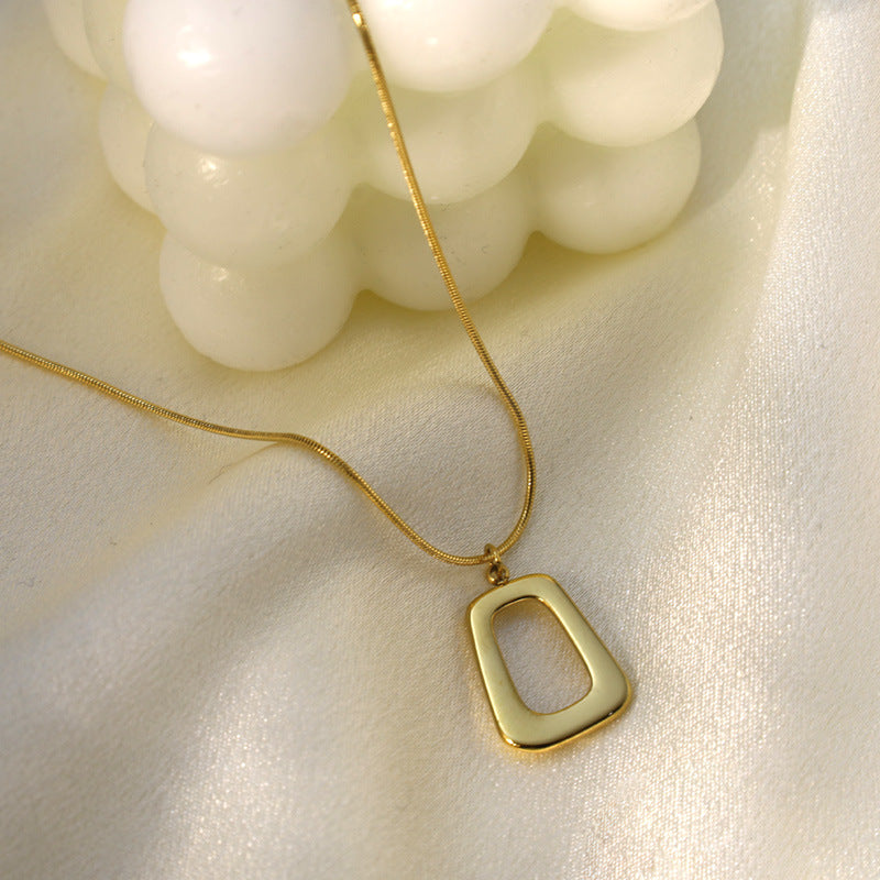 Gold Cutout Rectangle Pendant Necklace