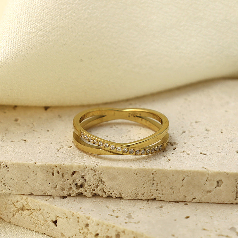 Lustre Crossing Zircon Ring